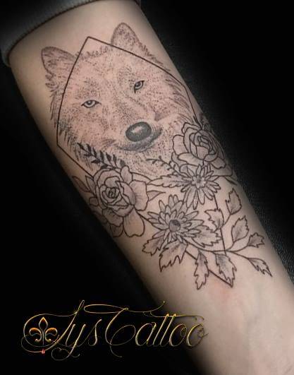 Trouver le meilleur salon de tatouage spécialiste du tatouage loup ou 
